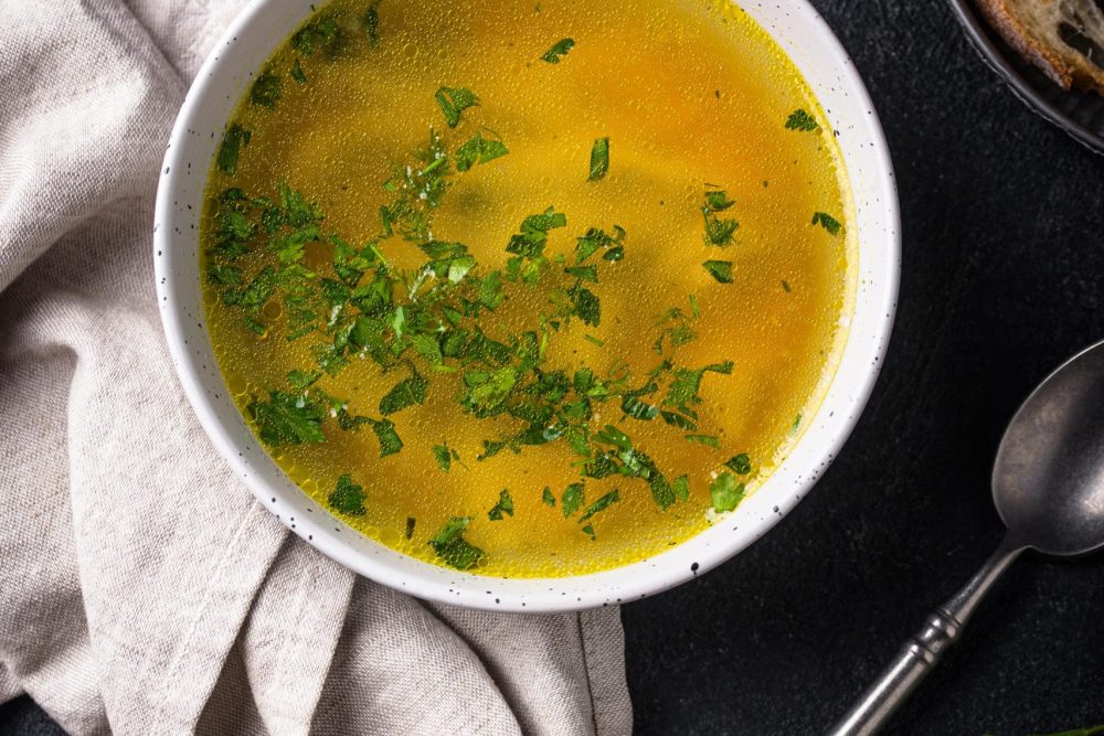 Chicken broth with parsley, healthy food Chicken broth with parsley, healthy home food